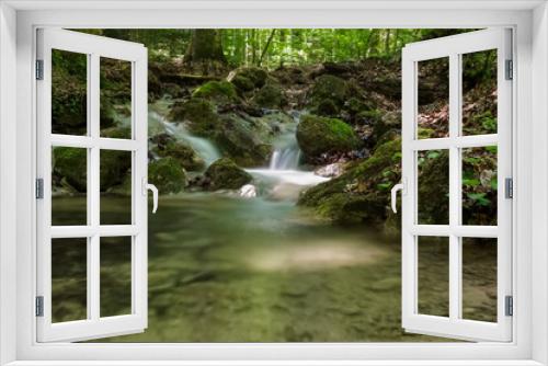 Fototapeta Naklejka Na Ścianę Okno 3D - beautiful soft clear water with a little waterfall an a basin in a forest