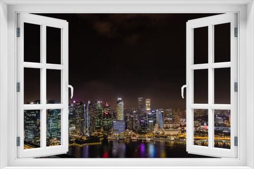 Fototapeta Naklejka Na Ścianę Okno 3D - Singapore view from Marina Bay Sand in the evening
