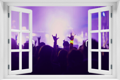 People with hands up at scene on event party entertainment concert.