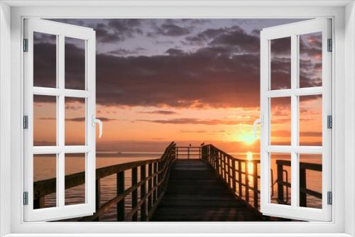 Fototapeta Naklejka Na Ścianę Okno 3D - pier at sunset, sea texture