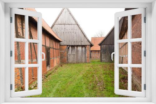 Fototapeta Naklejka Na Ścianę Okno 3D - Alte Scheune mit Fachwerk