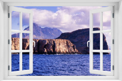 Fototapeta Naklejka Na Ścianę Okno 3D - Crete or Kreta, Greece - Breathtaking landscape of Rocky mountain terrain in an island of Balos Lagoon, Gramvousa Peninsula, municipality Kissamos, regional unit Chania against dramatic clouds