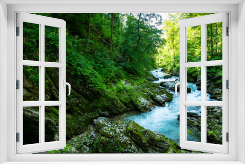 Fototapeta Naklejka Na Ścianę Okno 3D - blue river in a forest