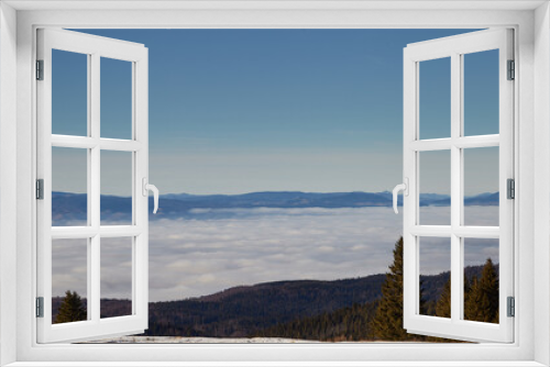 Fototapeta Naklejka Na Ścianę Okno 3D - Mountain top and above clouds