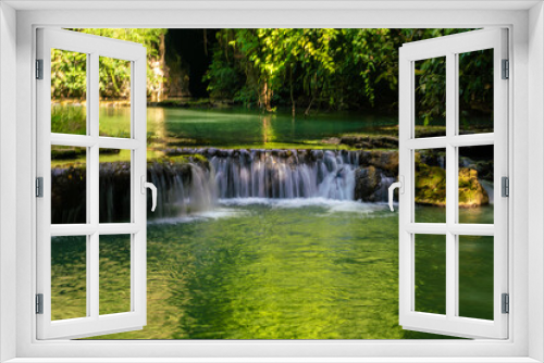 Fototapeta Naklejka Na Ścianę Okno 3D - Beautiful waterfall in tropical rainforest green tree background
