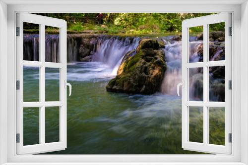 Fototapeta Naklejka Na Ścianę Okno 3D - Beautiful waterfall in tropical rainforest green tree background