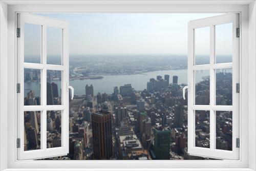 Fototapeta Naklejka Na Ścianę Okno 3D - Vista panoramica de los edificios y rascacielos emblemáticos de Manhattan (Nueva York). Estados Unidos de America