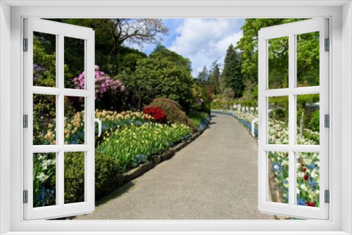 Fototapeta Naklejka Na Ścianę Okno 3D - Walkway in spring garden
