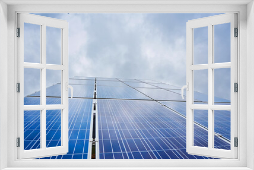 Fototapeta Naklejka Na Ścianę Okno 3D - The solar panel generates green electricity