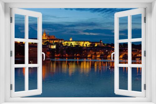Fototapeta Naklejka Na Ścianę Okno 3D - Evening view of Prague Castle and Charles Bridge over Vltava river from Novotneho Lavka, Prague, Czech
