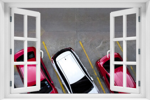 Fototapeta Naklejka Na Ścianę Okno 3D - Top view of car parked at concrete car parking lot with yellow line of traffic sign on the street. Above view of car in a row at parking space. No available parking slot. Outside car parking area.