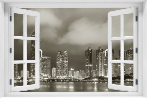 Fototapeta Naklejka Na Ścianę Okno 3D - Skyline and harbor of Hong Kong city at night