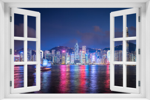 Fototapeta Naklejka Na Ścianę Okno 3D - Skyline Hong Kong city at sunset view from harbor in Hong Kong.