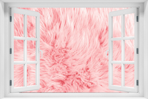 Light pink long fiber soft fur. Pink fur for background or texture. Fuzzy pink fur plaid. Shaggy blanket background. Fluffy fake textile fur. Flat lay, top view, copy space