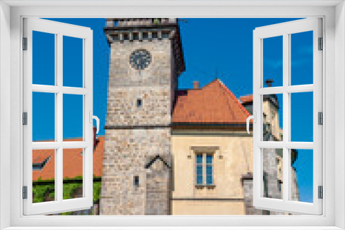 The tower of Hruba Skala Castle surrounded by Czech Paradise Park , Czech Republic