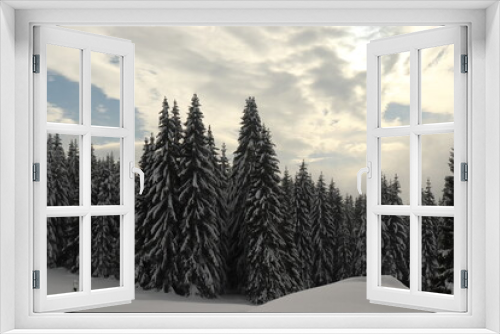 Fototapeta Naklejka Na Ścianę Okno 3D - snowy forest in winter with clouds