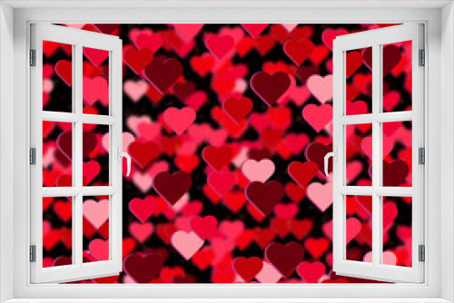 Blurred bright pink and red bokeh background with hearts on black. Red hearts bokeh background, great design for any purpose. Seamless pattern for decorative design of holidays.