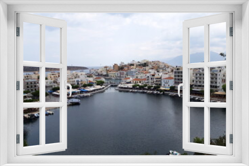 Fototapeta Naklejka Na Ścianę Okno 3D - Agios Nikolaos - CRETE
City under the clouds 