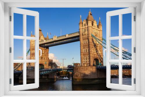 Fototapeta Naklejka Na Ścianę Okno 3D - A view of the Tower Bridge in the dusk