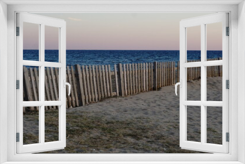Fototapeta Naklejka Na Ścianę Okno 3D - wooden fence on an empty beach