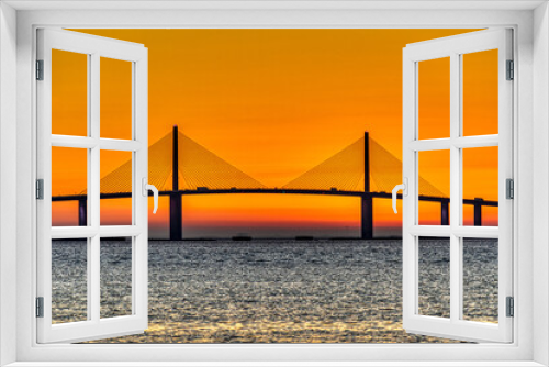 Fototapeta Naklejka Na Ścianę Okno 3D - Sunrise behind bridge