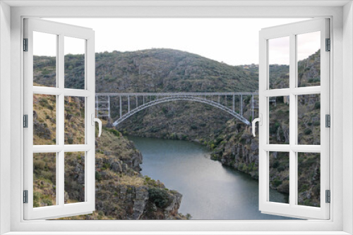 Fototapeta Naklejka Na Ścianę Okno 3D - The Requejo bridge is an engineering work built to cross the Duero River between the Sayago and Aliste regions, in the province of Zamora, Spain. The bridge was inaugurated on September 15, 1914.