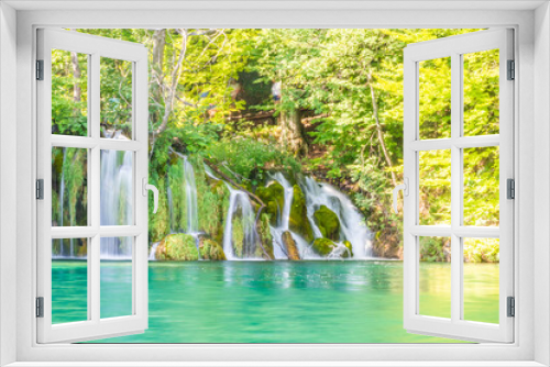 Fototapeta Naklejka Na Ścianę Okno 3D - Waterfalls flowing into the crystal water of Lake Plitvice