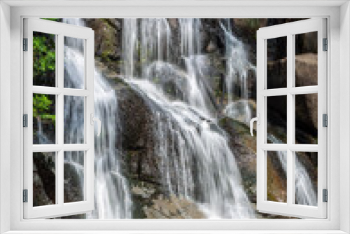 Fototapeta Naklejka Na Ścianę Okno 3D - waterfall cascading over rocks