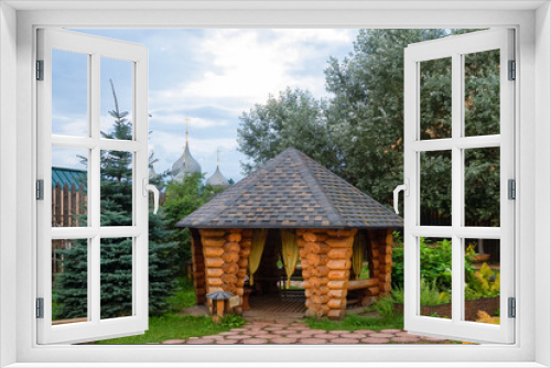Fototapeta Naklejka Na Ścianę Okno 3D - Gazebo in the yard. One of the most popular tourist places of the city is the Carved and decorated Snegurochka's tower-room