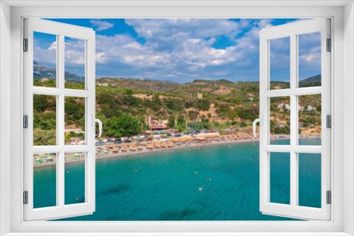 Fototapeta Naklejka Na Ścianę Okno 3D - Aerial view over Santova coastal area in Messinia, Greece. Summer scenery with beautiful seaside bars and tourists in Santova near Kalamata city, Greece