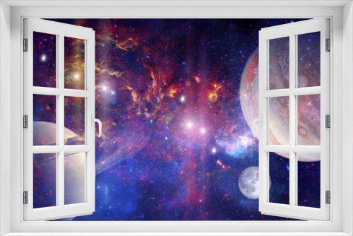 Fototapeta Naklejka Na Ścianę Okno 3D - Space wallpaper banner background. Stunning view of a cosmic galaxy with planets and space objects. Elements of this image furnished by NASA.