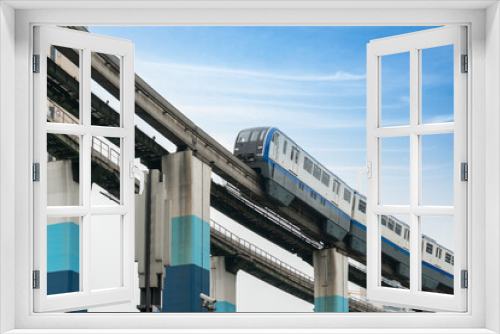Fototapeta Naklejka Na Ścianę Okno 3D - Light rail runs on bridges at high speed in Chongqing, China