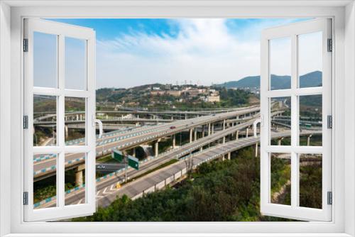 Fototapeta Naklejka Na Ścianę Okno 3D - The intersecting multi-storey overpass in Chongqing, China