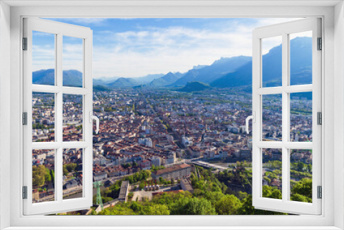 Fototapeta Naklejka Na Ścianę Okno 3D - Grenoble, a mesmerizing view of the city and the Alps from the observation deck, France, spring.