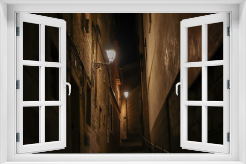 Fototapeta Naklejka Na Ścianę Okno 3D - street of the old town of toledo at night