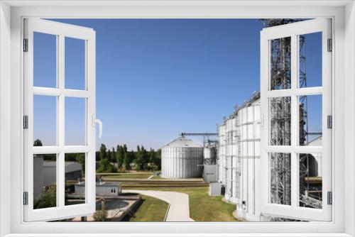 Fototapeta Naklejka Na Ścianę Okno 3D - View of modern granaries for storing cereal grains outdoors