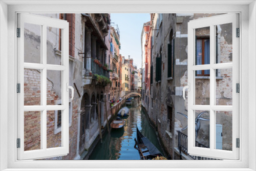 Fototapeta Naklejka Na Ścianę Okno 3D - Panoramic view of Venice narrow canal with historical buildings and boat