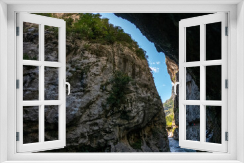 Fototapeta Naklejka Na Ścianę Okno 3D - The Cares Route in the heart of Picos de Europa National Park, Cain-Poncebos, Asturias, Spain. Narrow and impressive canyon between cliffs, bridges, caves, footpaths and rocky mountains.