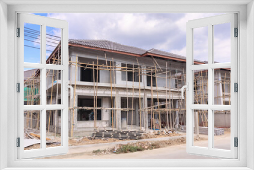 Fototapeta Naklejka Na Ścianę Okno 3D - construction residential new house in progress at building site