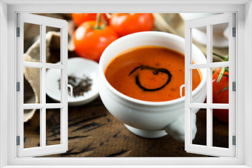 Fototapeta Naklejka Na Ścianę Okno 3D - Homemade spicy tomato soup in a white bowl