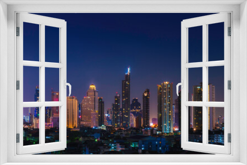 Fototapeta Naklejka Na Ścianę Okno 3D - Skyscrapers and views of Bangkok city at night