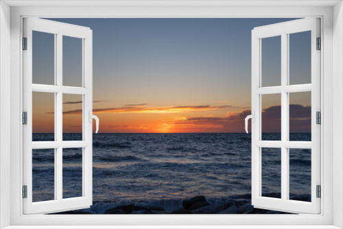 Fototapeta Naklejka Na Ścianę Okno 3D - landscape - sunset on the coast, waves, horizon. top view.