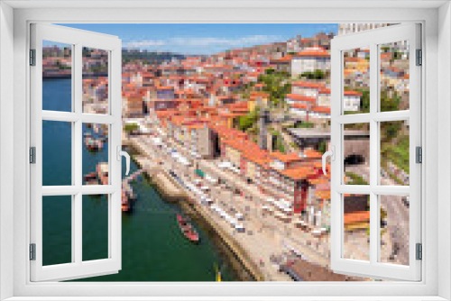 Fototapeta Naklejka Na Ścianę Okno 3D - Porto, Portugal. Vertical Cityscape. Bairro da Ribeira, iconic quarter seen from high angle on sunlight.