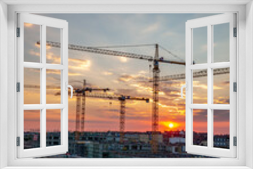 Fototapeta Naklejka Na Ścianę Okno 3D - Construction site during a sunset
