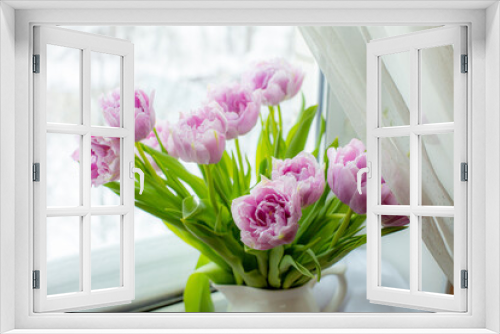 Fototapeta Naklejka Na Ścianę Okno 3D - a vase of tulips stands on the window
