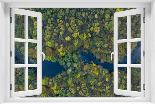 Fototapeta Naklejka Na Ścianę Okno 3D - view from above on autumn trees in yellow in the park and lake
