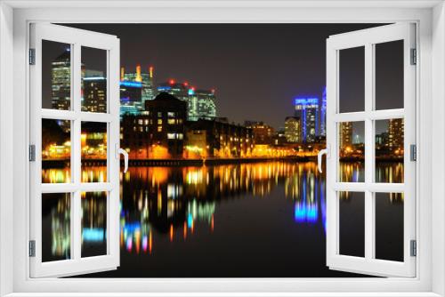 Fototapeta Naklejka Na Ścianę Okno 3D - Canary Wharf, East London UK skyline at night
