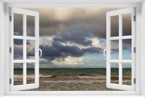 Fototapeta Naklejka Na Ścianę Okno 3D - Rainbow and clouds at a sea