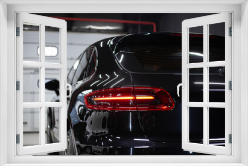 Fototapeta Naklejka Na Ścianę Okno 3D - Car detailing series : Closeup black car lamp
