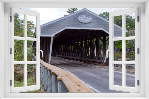 Fototapeta Naklejka Na Ścianę Okno 3D - A road through an historic covered bridge